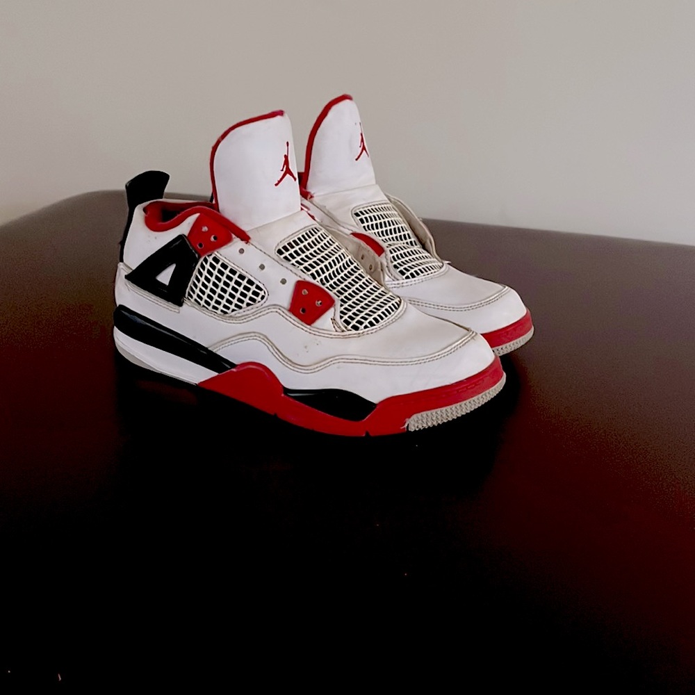 Jordan 4 youth size 3. White black and red.